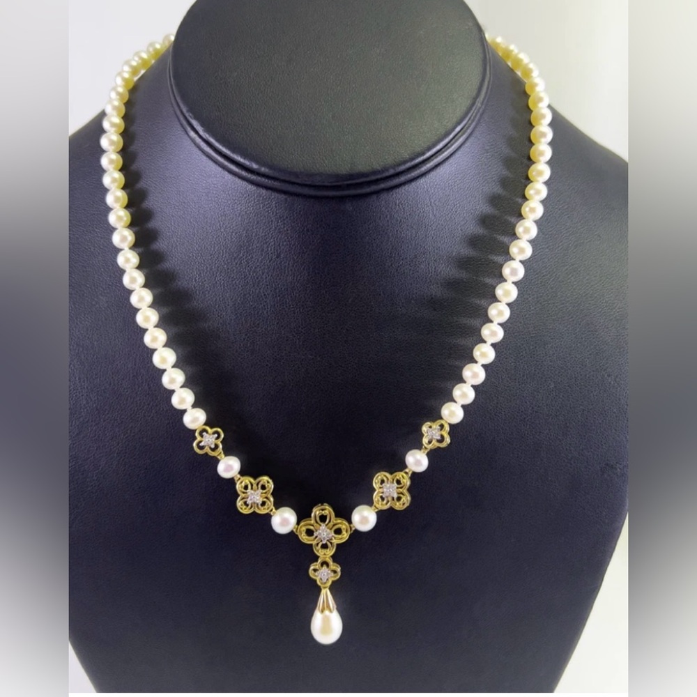 10 karat gold, diamond, and beautiful pearls necklace